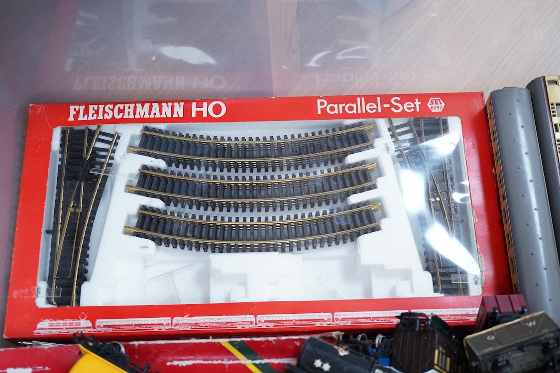 A quantity of HO and 00 gauge railway, comprising; twelve locomotives including a boxed Fleischmann 0-4-0 catenary electric locomotive, a Hornby Dublo Duchess of Atholl, etc. eleven bogie coaches, sixteen freight wagons,